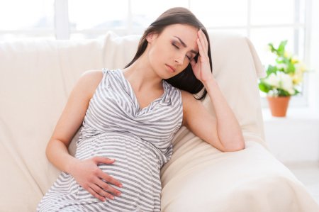 Опасна ли боль в животе при беременности?